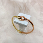 Load image into Gallery viewer, Intertwined Bangle in Gold (DBRBRC-0004)
